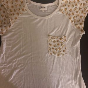 White shirt with yellow flowers with ruffle sleeve